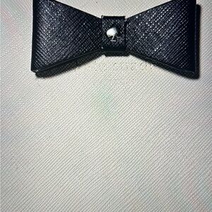 Kate Spade Hazel Court, Lacey cream and black bowtie leather wallet.